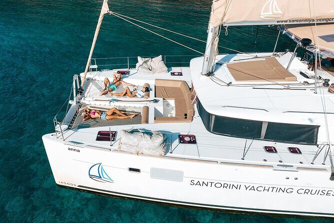 Santorini Sunset Sailing Cruise: Dinner, BBQ, Open Bar, Transfers - Practical Aspects and What to Expect