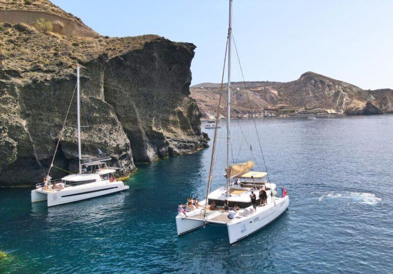 Santorini: Sunset Sailing Cruise, with Dinner and Drinks - Dining on Board: Greek Cuisine with a View