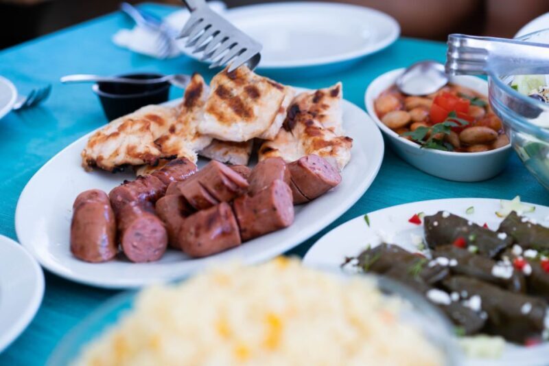 Santorini: Traditional Wooden Boat Tour with Meal and Wine - FAQ