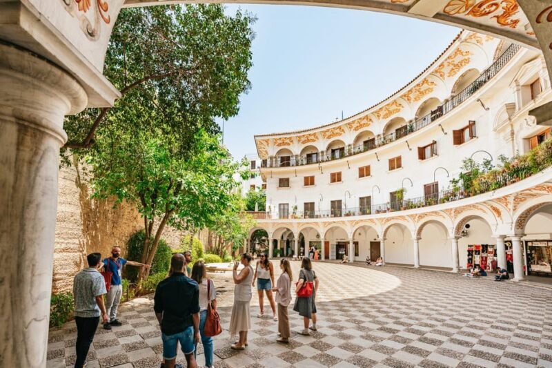 Seville: Tapas, Taverns and History Guided Walking Tour - Key Points