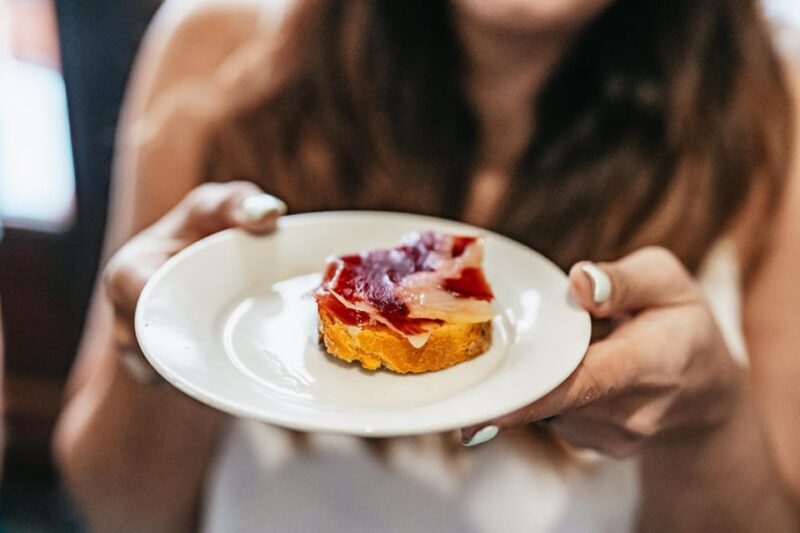 Seville: Tapas, Taverns and History Guided Walking Tour - The Guides: Knowledge, Humor, and Local Secrets