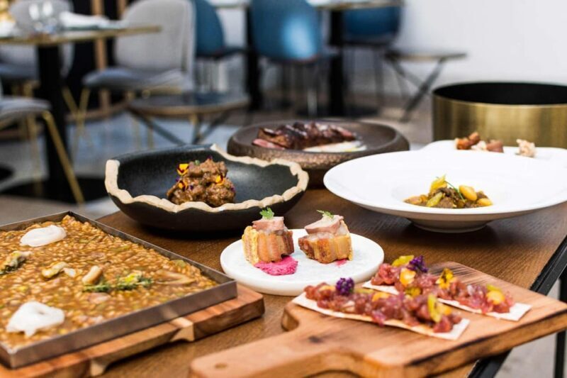 Seville with a Michelin Chef: Gastronomic Tour around Secret Corners - Stop 1: Traditional-Style Seville Restaurant