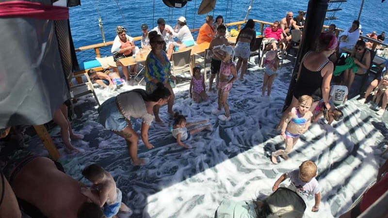 Side: Dolphin Boat Tour With Lunch Foam party Swimming - Who Should Consider This Tour?