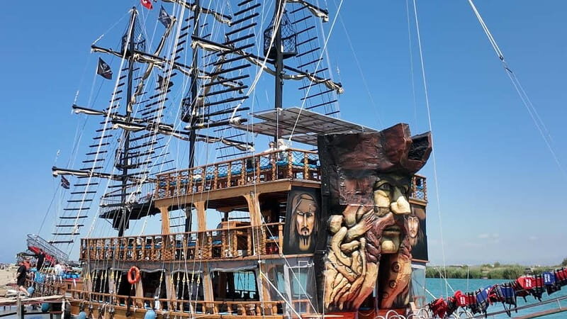 Side: Dolphin Boat Tour With Lunch Foam party Swimming - The Sum Up