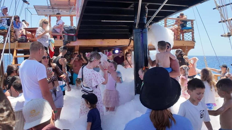 Side: Dolphin Boat Tour With Lunch Foam party Swimming - FAQ