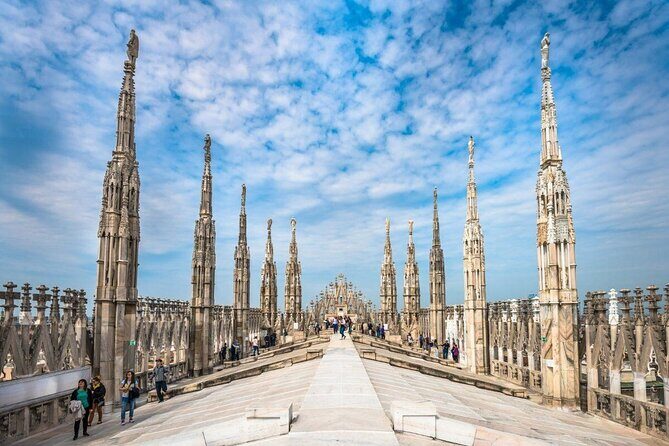 Sky-High Delights: Duomo Tour with Rooftop Adventure! - The Sum Up