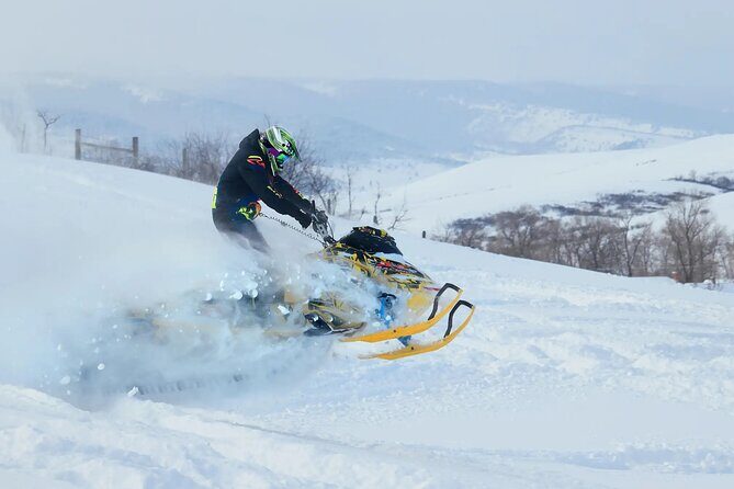 Snowmobile Riding Adventure in Golden Town - Meta Description: