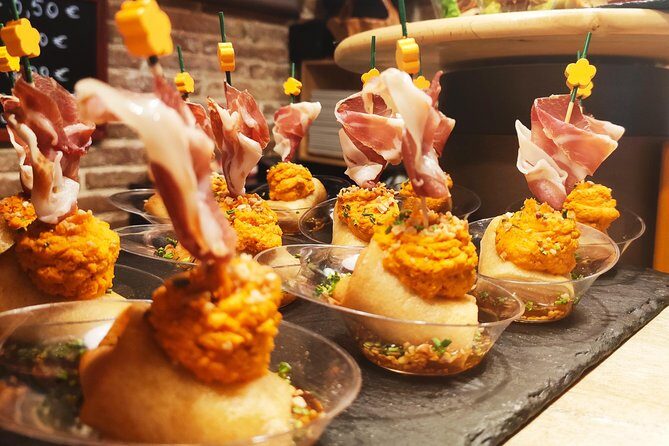 Spanish Wine and Tapas tour in a local Neighborhood in Barcelona - Key Points