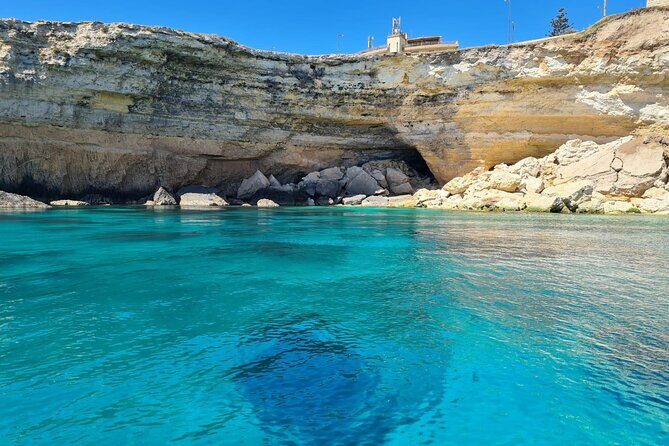 Sunset boat tour with aperitif and swimming break - The Sum Up