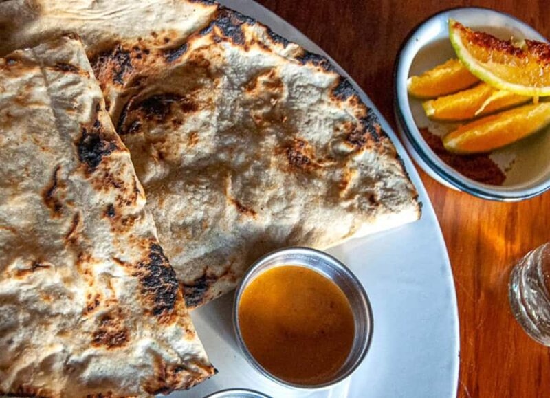 Sunset in Huatulco and pairing: Mezcal and Tlayuda - A Tasting of Local Flavors