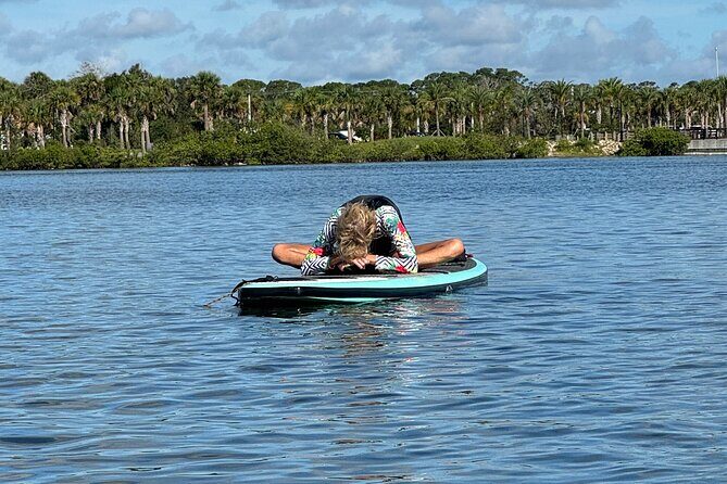 SUP Yoga: Paddleboard Yoga Experience in Nature - An environment of calm and connection