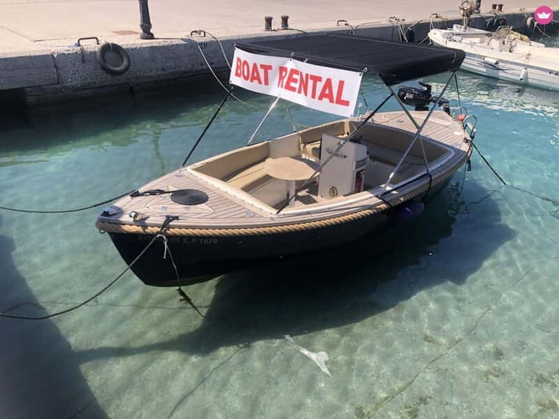 Swim to Antony Quinn bay Ladiko & Traunou caves with skipper - The Champagne and Additional Perks