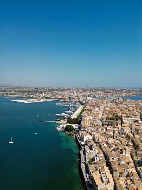 Syracuse: Boat tour Ortigia island,seacaves and Explanations - FAQs