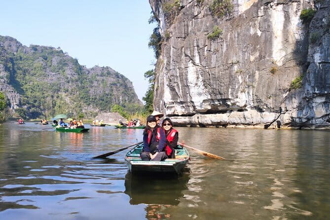 Tam Coc Boating Hoa Lu Private Day Tour and Local Family Visit - Key Points