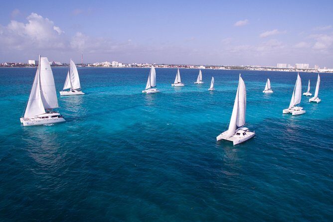 Top Sailing to Isla Mujeres with lunch and open bar from Cancun - The Group Dynamic and Duration
