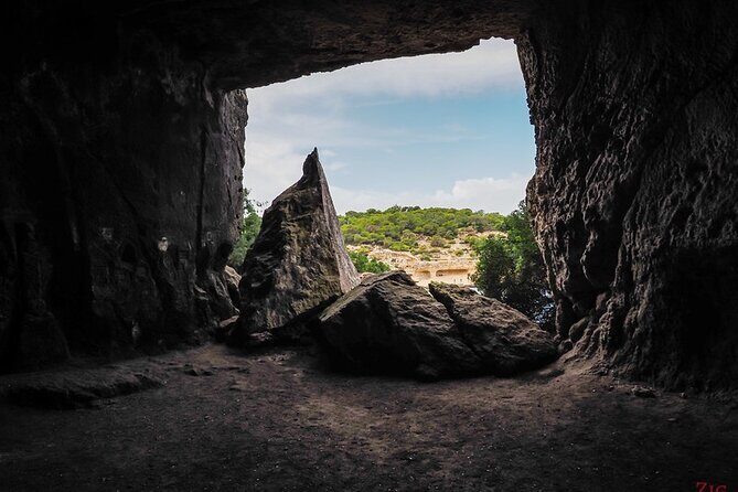 Tour Beach Portal Vells, Cave Portal Vells. - The Sum Up