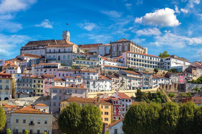 Transfer Tour Lisbon/Porto with 2 stops options Óbidos, Nazaré, Fátima, Coimbra - The Sum Up