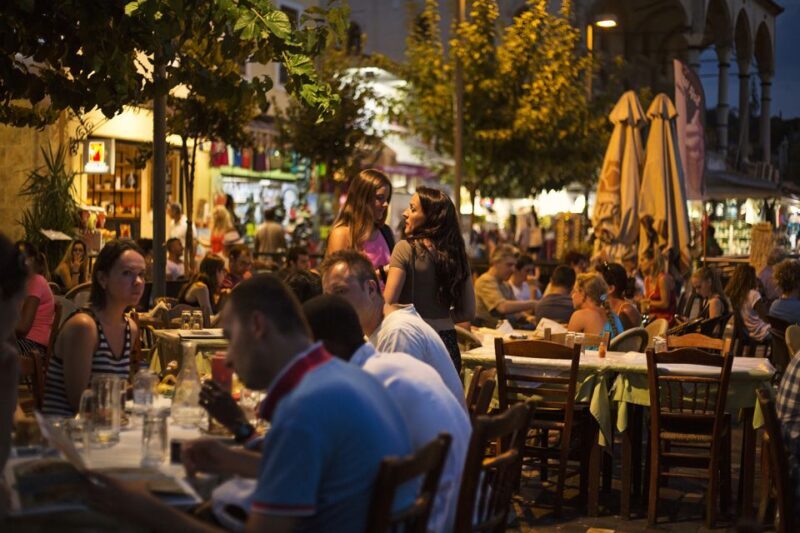 Twilight Athens Tour inc. rooftops, tastings & 3 drinks - Walking Through Historic Neighborhoods & Legends