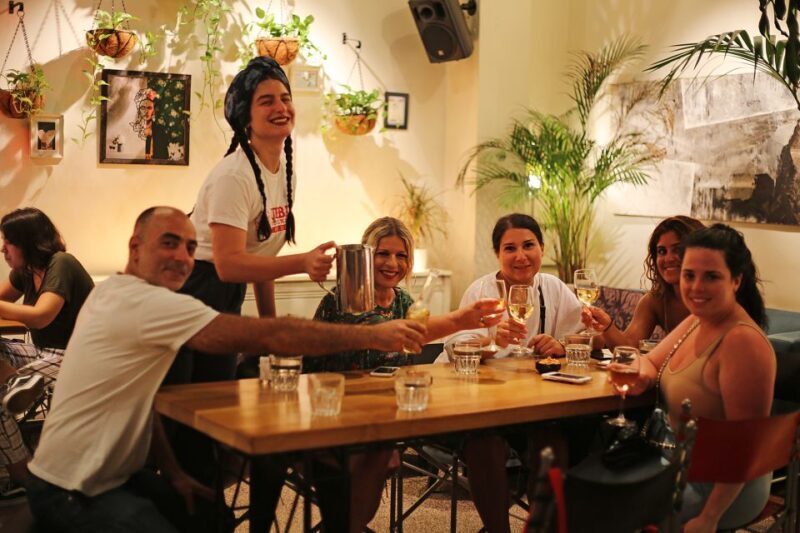 Twilight Athens Tour inc. rooftops, tastings & 3 drinks - Sampling Greek Wines, Spirits, and Meze