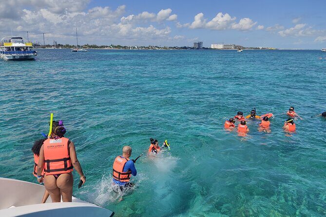 Unlimited Party Catamaran to Isla Mujeres from Playa del Carmen - A lively, social way to visit Isla Mujeres