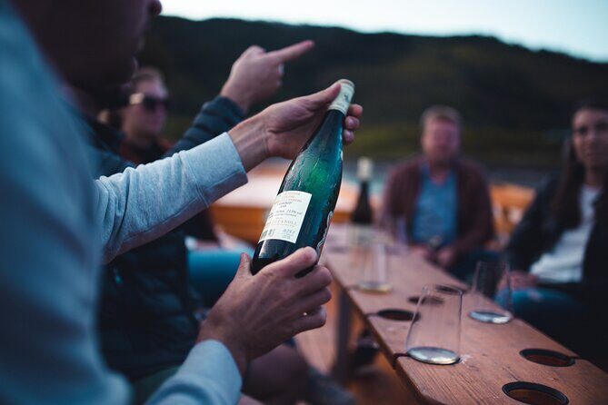 Wine tasting on traditional wooden boats in Wachau Valley - A Closer Look at the Experience