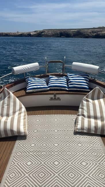 Wooden Gozzo Tour with Aperitif Towards the Beautiful Coast of Polignano - Key Points