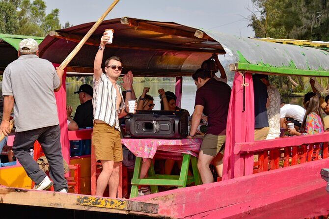 Xochimilco International boat party with open bar and tacos - Key Points