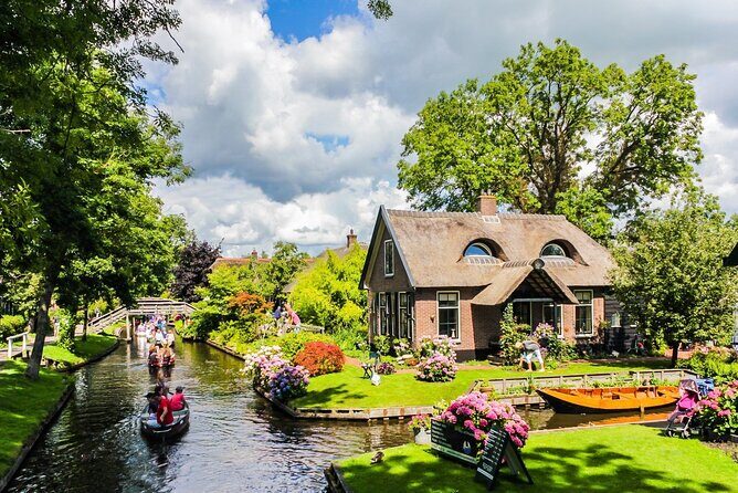 Zaanse Schans Giethoorn Private Tour from Amsterdam Canal Cruise - Key Points