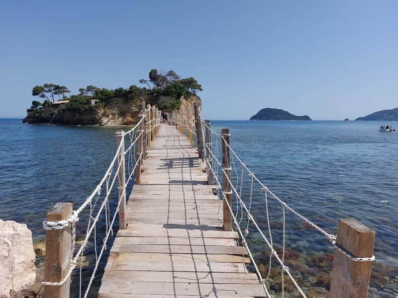 Zakynthos: Sunset Cruise to Myzithres with Wine & transfer - Myzithres Rocks and Sunset Magic